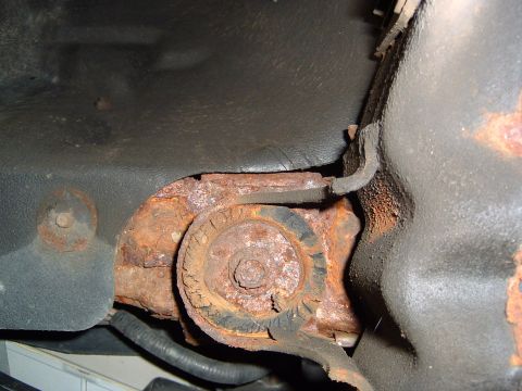 1993 Ford Bronco - This image shows a heavily corroded suspension component, not indicative of a specific vehicle year.
