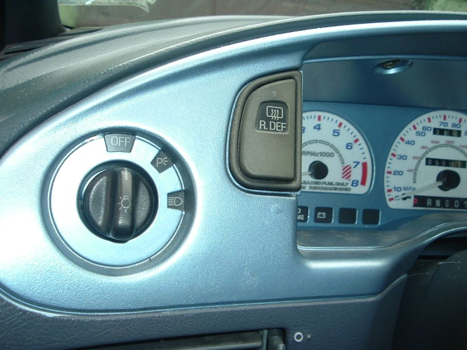 1993 Ford Taurus interior dashboard with light controls and gauges visible