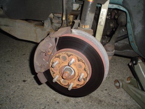 1993 Ford Taurus - ahh..!! No wheel.