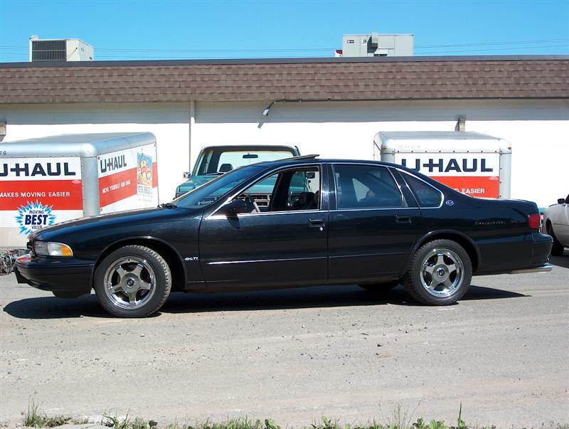 1996 Chevrolet Impala sedan parked outside