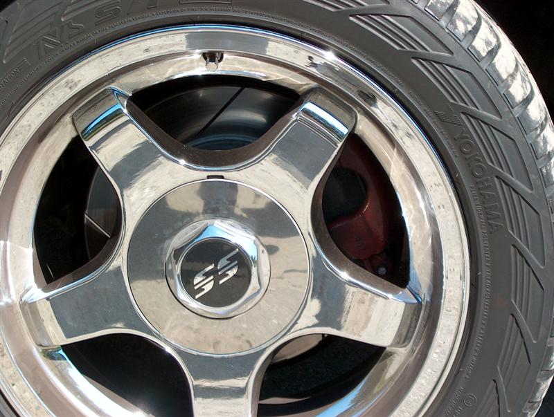 Chrome SS five-spoke wheel with Yokohama tire and red brake caliper