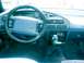 1993 Ford Taurus - Interior view of a car's dashboard, showing the steering wheel and controls.