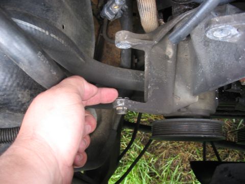 1989 Ford Bronco - be sure to remember that this little bolt guide needs to be tapped in (towards the radiator) to make room for the new alternator