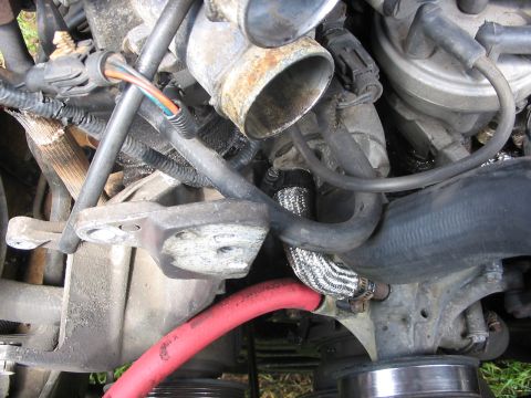 1989 Ford Bronco - I shaved the ends on the elbow hose where the ends had frayed and bubbled allowing the hose to leak. cut off about 1/2 inch on either end.…