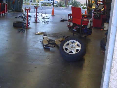 1993 Ford Taurus - Ahh.. An SHO wheel just strewn about.. that's not good.