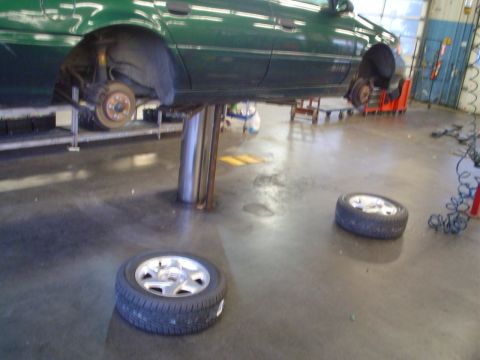 1993 Ford Taurus - the new tires, awaiting their position.