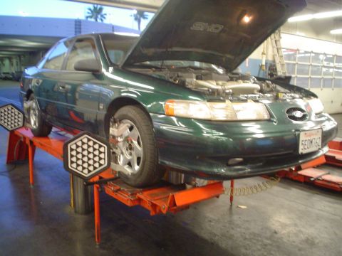 1993 Ford Taurus - with the 4 wheel alignment stuff on.
