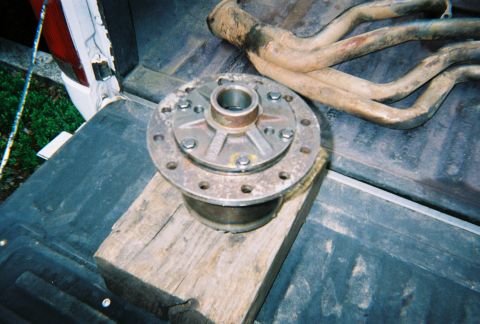 1978 Ford Bronco - Differential and exhaust manifold are shown in the bed of a truck.