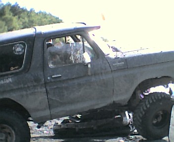 1985 Ford Bronco - This vintage Ford Bronco is shown from the front three-quarter view, highlighting its exterior.