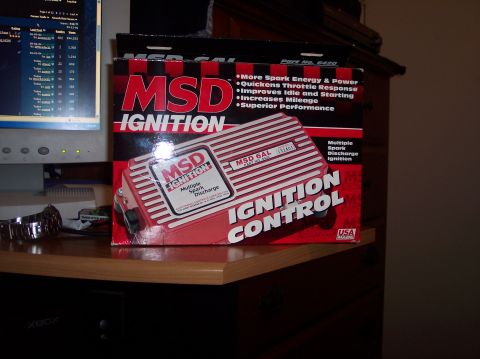 1990 Ford Bronco - A box for an MSD Ignition Control unit is displayed on a desk.