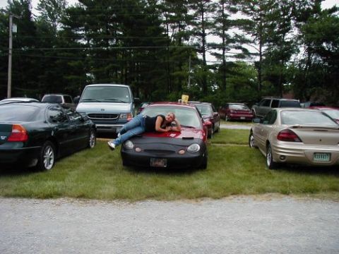 1997 Ford Taurus - Nicole poses on Lil Red Bomb