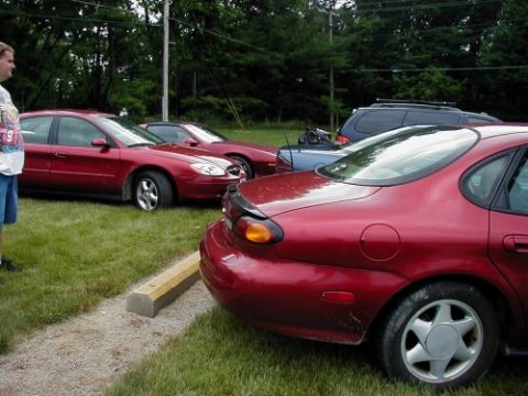 1997 Ford Taurus - Two T-Red Tauruses, how perfect!