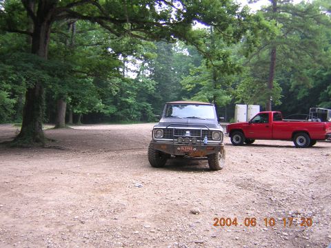 1984 Chevrolet Blazer - Two trucks are parked in a dirt lot surrounded by trees. A date stamp indicates the photo was taken on June 10, 2004.