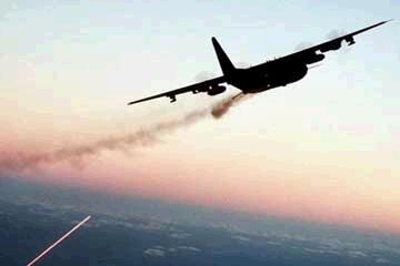 1988 Ford Bronco - A cargo plane flies through the sky, leaving a trail of smoke behind it.