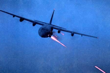 1988 Ford Bronco - A military cargo plane is seen in flight, deploying flares.