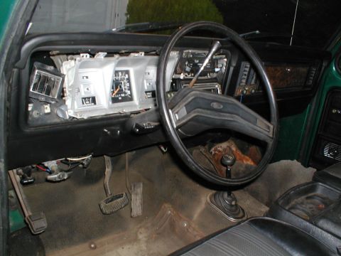 1979 Ford Bronco - Interior view of a 1979 Ford Bronco, focusing on the dashboard and driver's area.