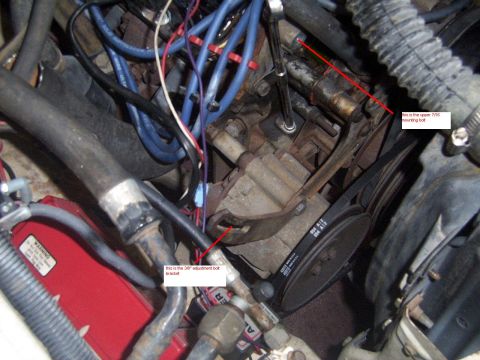 1978 Ford Mustang II - This image shows a section of an engine bay with various hoses, wires, and belts visible, along with some annotated bolts.