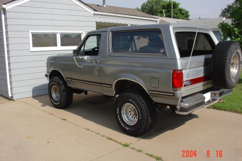 1987 Ford Bronco - This 1987 Ford Bronco is shown from a three-quarter front view, its iconic rear-mounted spare tire.