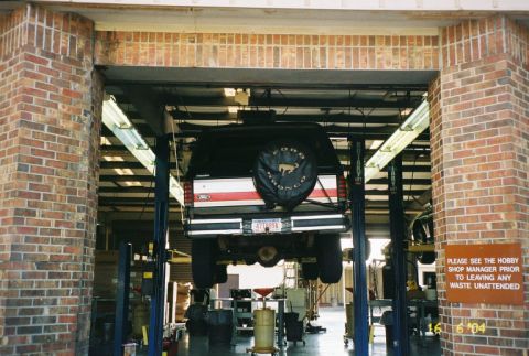 1988 Ford Bronco - Rear view of a 1988 Ford Bronco being serviced on a lift in a hobby shop.