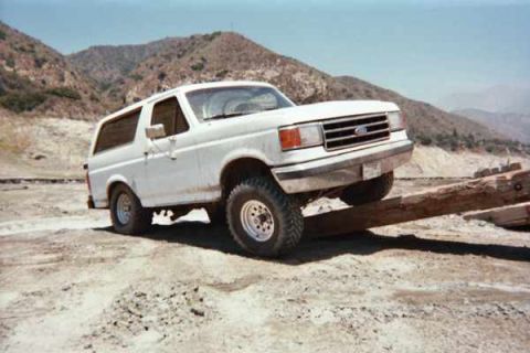1990 Ford Bronco - Trying to flex completely stock suspension. Trans would'nt let me climb higher