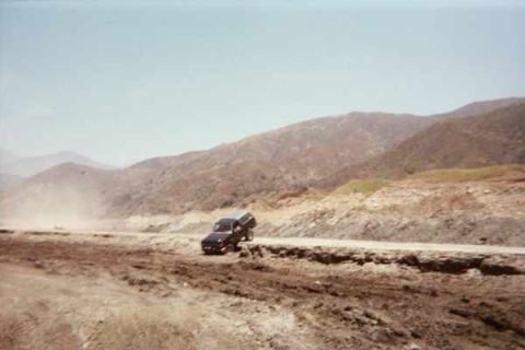 1990 Ford Bronco - perry same drop but me running on foot to get the pic. His back tire must of been 4' in the air! It looked COOL!! but I was to slow with th…
