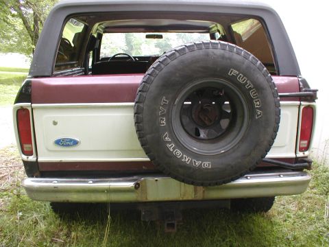 1979 Ford Bronco II - This Ford Bronco features a two-tone paint job and a spare tire on the rear door.