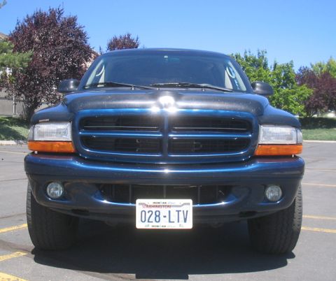 2001 Dodge Durango - need to rip off that bug deflector and get an after market grill inserts...AAR 'cuda hood...etc.