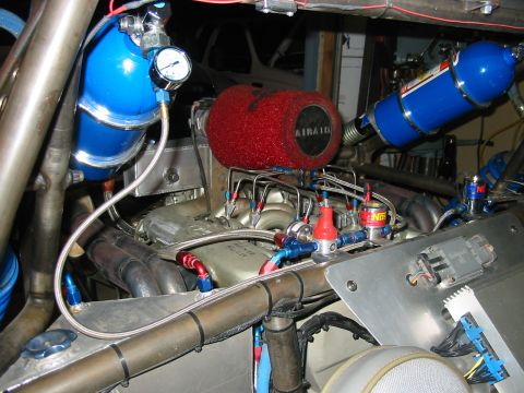 1993 Ford Taurus - Custom engine bay setup nitrous oxide tanks and performance air intake system.