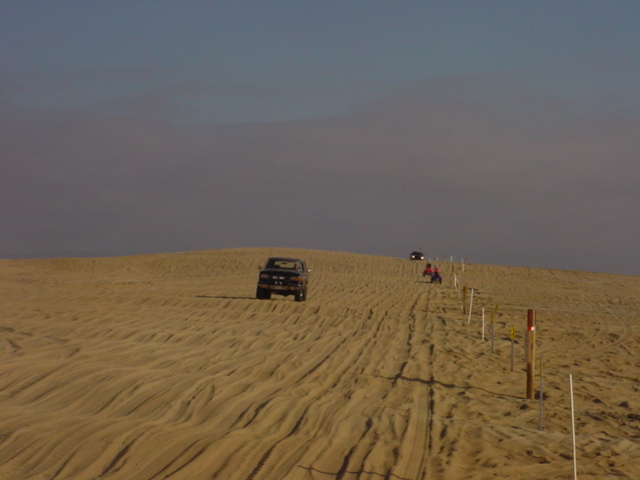 Chris driving my bronco and hitting the whoops,  the soft cepek coils did alright.