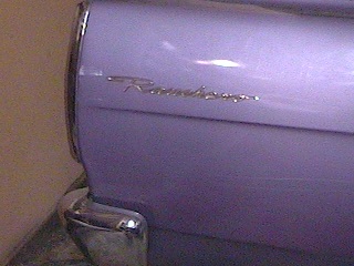 1968 Ford Ranchero - A close-up view of the 'Ranchero' emblem on the side of a vehicle.