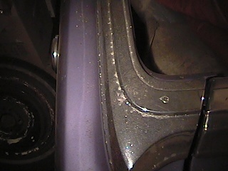 1968 Ford Ranchero - Close-up of a vehicle's frame and tire, with a SuperMotors watermark visible.