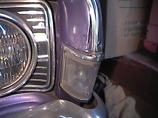 1968 Ford Ranchero - Close-up of the 1968 Ford Ranchero's headlight and turn signal assembly.