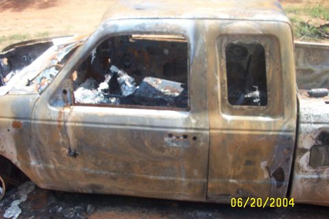 1979 Ford F-150 - This severely damaged pickup truck shows extensive fire damage to its exterior and interior.