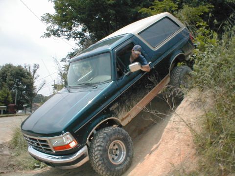 1995 Ford Bronco - This 1995 Ford Bronco is navigating a challenging off-road trail.