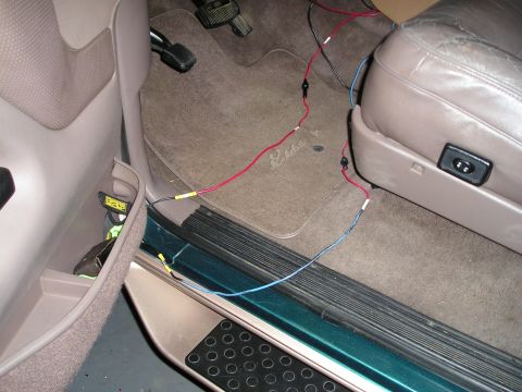 1996 Ford Bronco - Wiring is visible along the floor and door sill of this vehicle's interior.