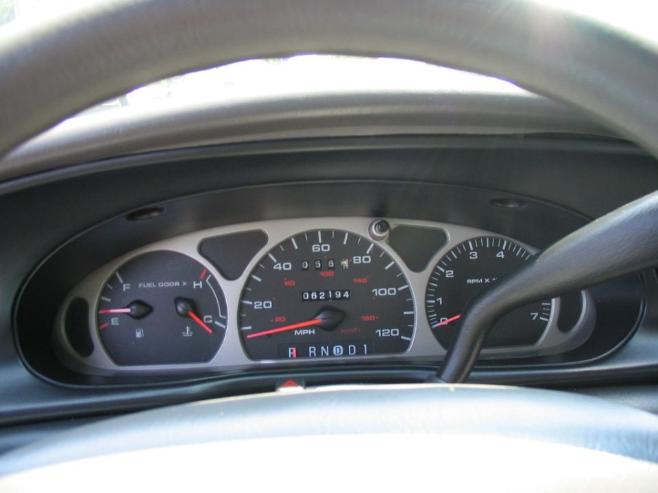 Instrument cluster reading 062194 miles with speedometer, tach and fuel gauges