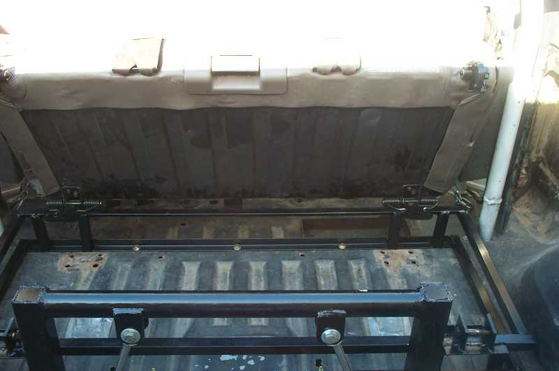 Seat up showing the cargo space.