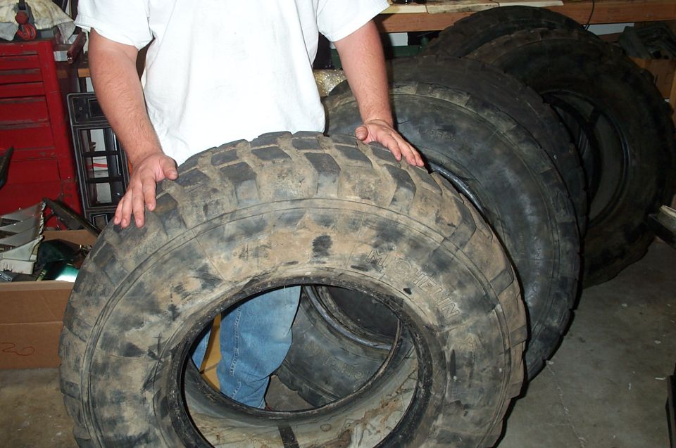 12.50R20 Michelin XL's  They measure 40" tall on the loaded bronco.