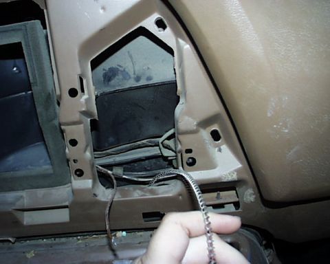 1988 Ford E250 - Interior view of a 1988 Ford E250 dashboard, revealing exposed wiring and internal components.