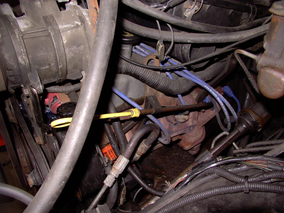 Either side is a jungle of heat shields, plumbing, braces, engine pulling tabs,etc. It'll be a welcome relief from all these stock obstructions !
