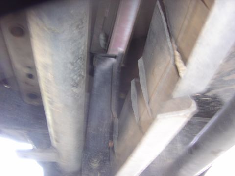 1993 Ford Bronco - Close-up view of the undercarriage, showing structural components and suspension elements.