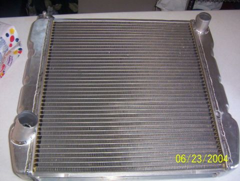 1974 Ford Mustang II - A radiator is shown, with a date stamp of 06/23/2004 and the SuperMotors logo visible in the lower right corner.