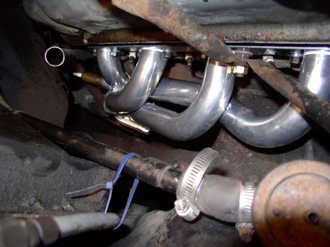 1986 Ford Bronco - Both braces in place and air pump tube tie-wrapped out of the way.