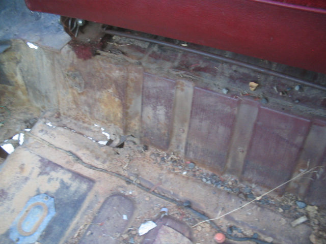 below rear seat