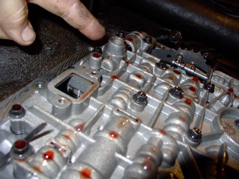 1986 Ford Bronco - Here's the valvebody without the filter on it. Note the round snout there. That's the one people tell you to make sure only one seal goes b…