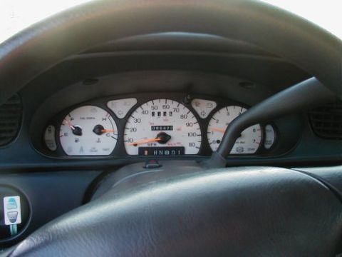 1997 Ford Taurus - The dashboard of a 1997 Ford Taurus displays the odometer reading and gear selection.