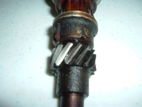 1993 Ford Taurus - Close-up view of a distributor gear, showing wear on its teeth.