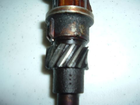 1993 Ford Taurus - This is a close-up view of a distributor gear, showing its worn helical teeth.