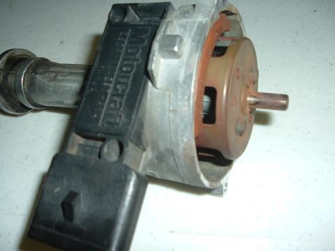 1993 Ford Taurus - A close-up view of a Motorcraft distributor part, showing internal components.