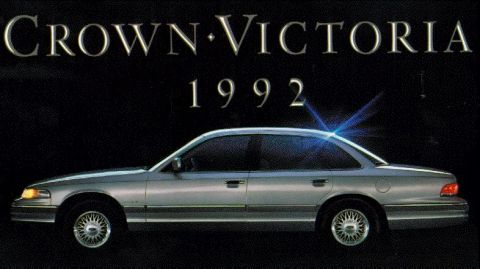 1992 Ford Crown Victoria - This 1992 Ford Crown Victoria is shown in a side profile, highlighting its classic sedan design.